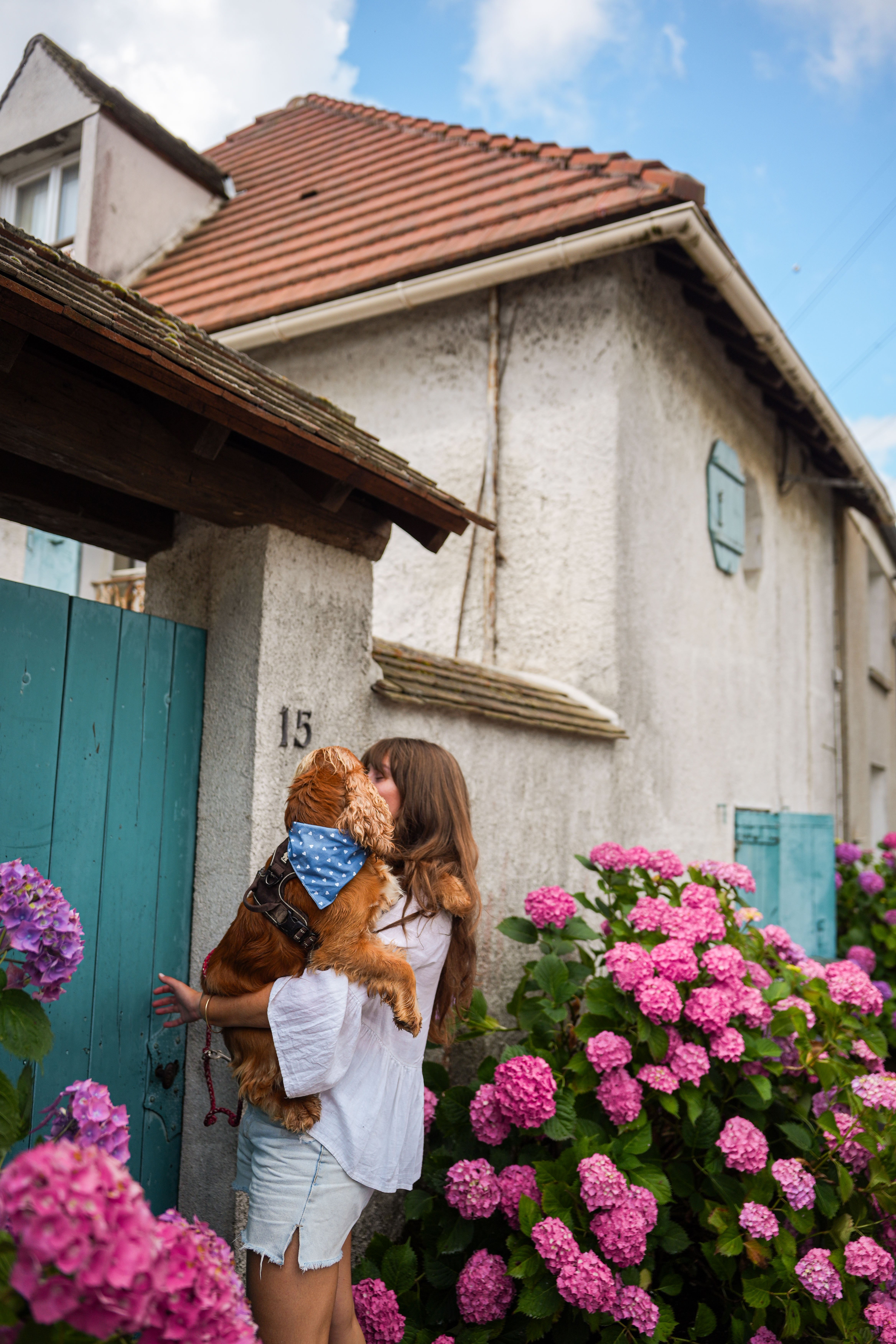 Pet product branding shoot for Woofgang – dog accessories in a French countryside setting.