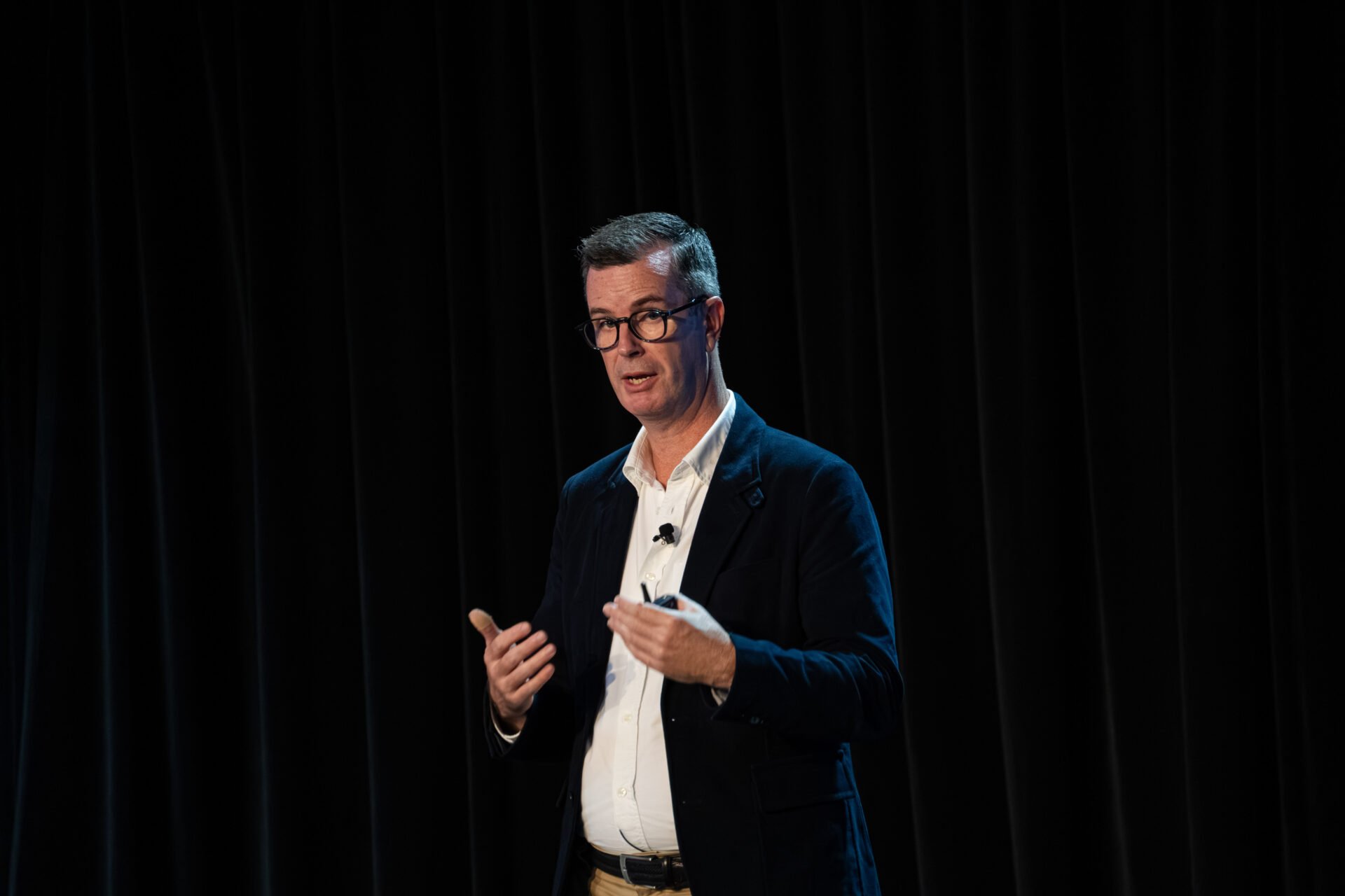 Keynote speaker presenting during corporate conference in Cairns